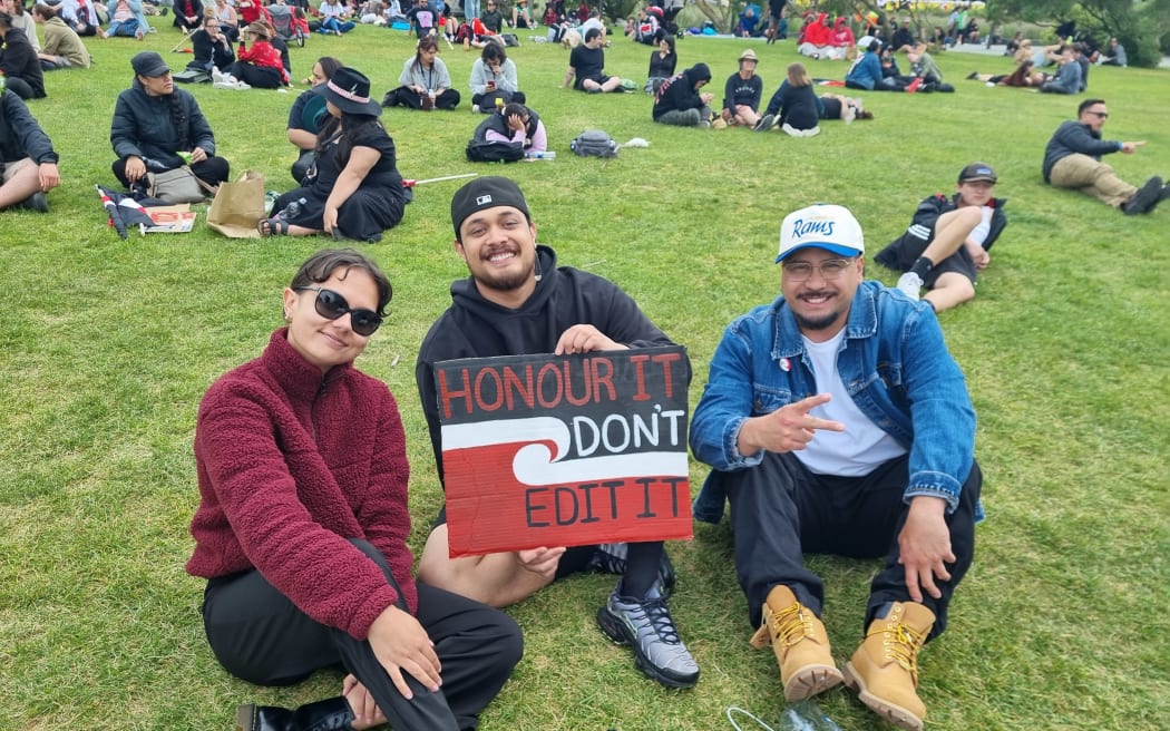Protesters relax at Waitangi Park after te Hīkoi mō te tiriti reached Parliament.