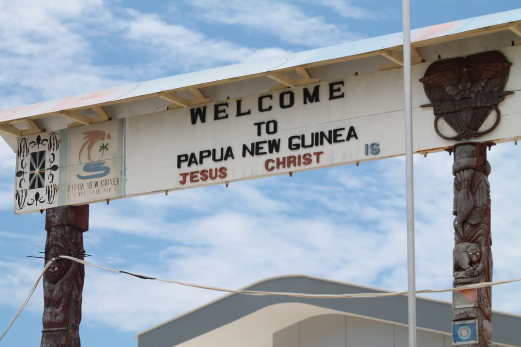 A sign at Wutung on the Papua New Guinea border with Indonesia.