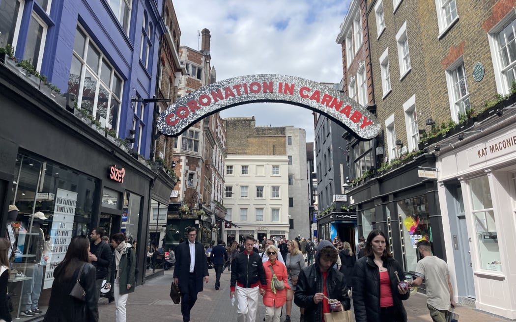 A sign reading Coronation in Carnaby above London's Carnaby Street. 3 May 2023.