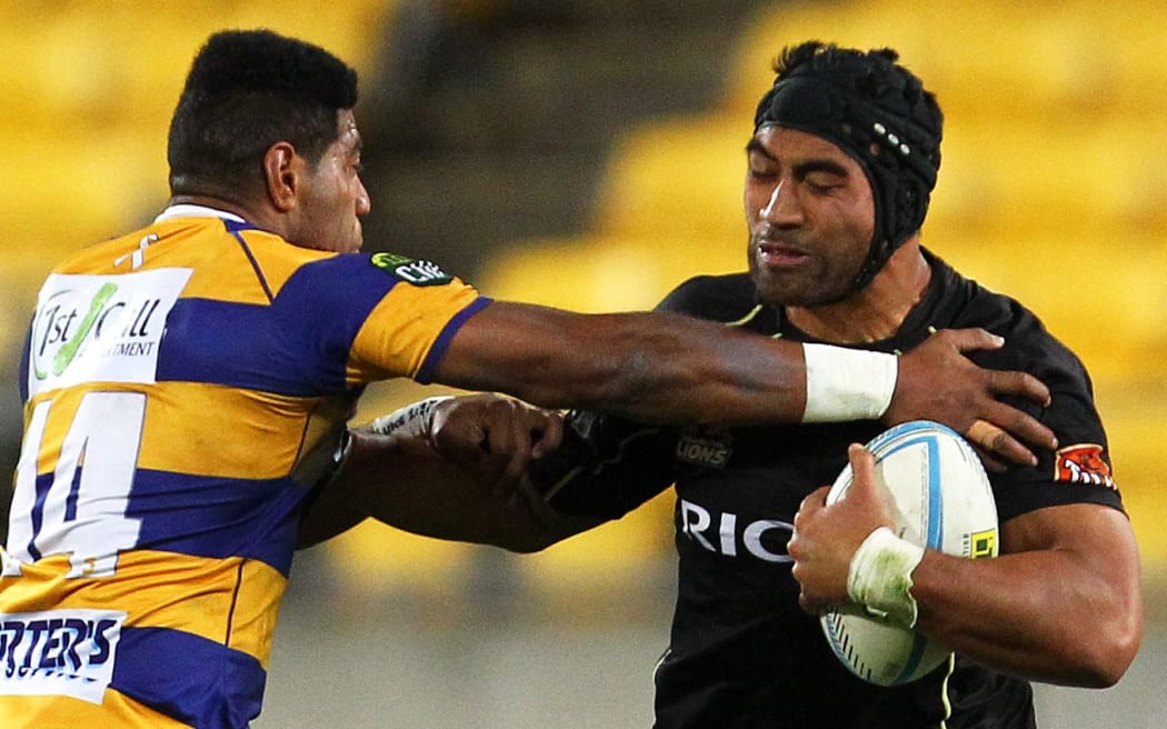 Lion's Victor Vito on the attack during the 2013 ITM Cup. Wellington Lions v BOP Steamers.