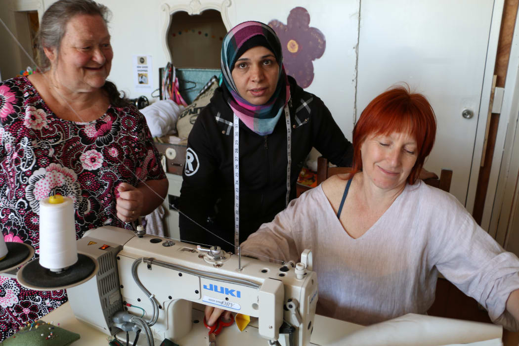 Sewing Tutor Linda (left), Sew Good mama Safaa and tutor Sally Gray at The Remakery, Wellington