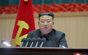This picture taken on December 4, 2023 and released from North Korea's official Korean Central News Agency (KCNA) via KNS on December 5, 2023 shows North Korea's leader Kim Jong Un addressing the Fifth National Mothers' Congress in Pyongyang. (Photo by KCNA VIA KNS / AFP) / South Korea OUT / REPUBLIC OF KOREA OUT
---EDITORS NOTE--- RESTRICTED TO EDITORIAL USE - MANDATORY CREDIT "AFP PHOTO/KCNA VIA KNS" - NO MARKETING NO ADVERTISING CAMPAIGNS - DISTRIBUTED AS A SERVICE TO CLIENTS / THIS PICTURE WAS MADE AVAILABLE BY A THIRD PARTY. AFP CAN NOT INDEPENDENTLY VERIFY THE AUTHENTICITY, LOCATION, DATE AND CONTENT OF THIS IMAGE --- /
