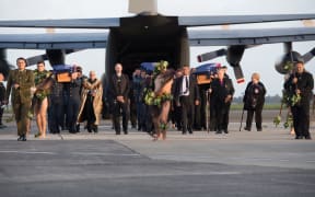 The remains of Defence Force are handed over to families after being returned from Suva and Pago Pago in a ceremony in May.