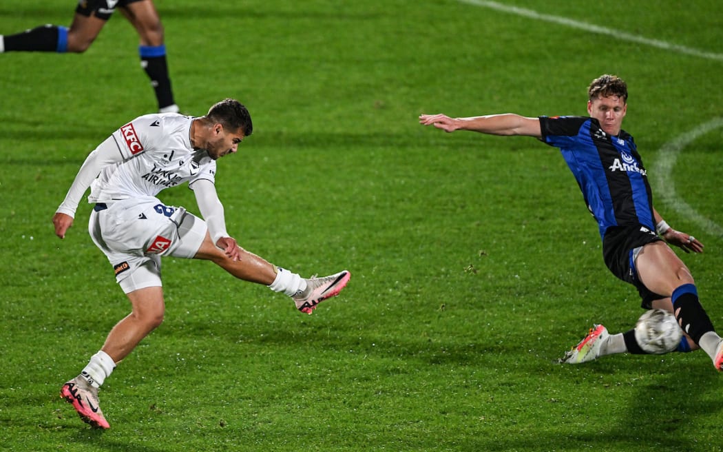 Zinédine Machach of Melbourne Victory takes a shot at goal to score, Auckland FC v Melbourne Victory FC, leg 2 of the A-League semi final at Go Media Stadium, Auckland.