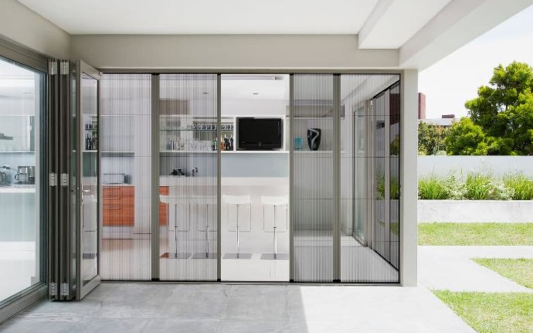 Retractable fly screen doors are a solution for large sliding doors.
