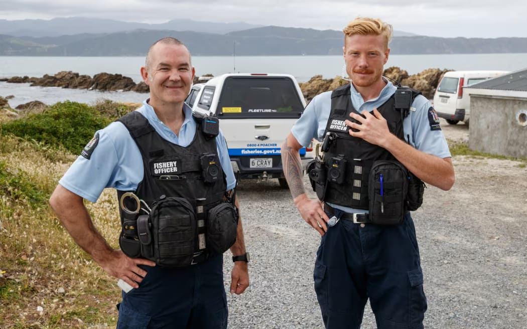 Fisheries officers Allan Gilmour, left, and Korban Aitken say species limits are important.