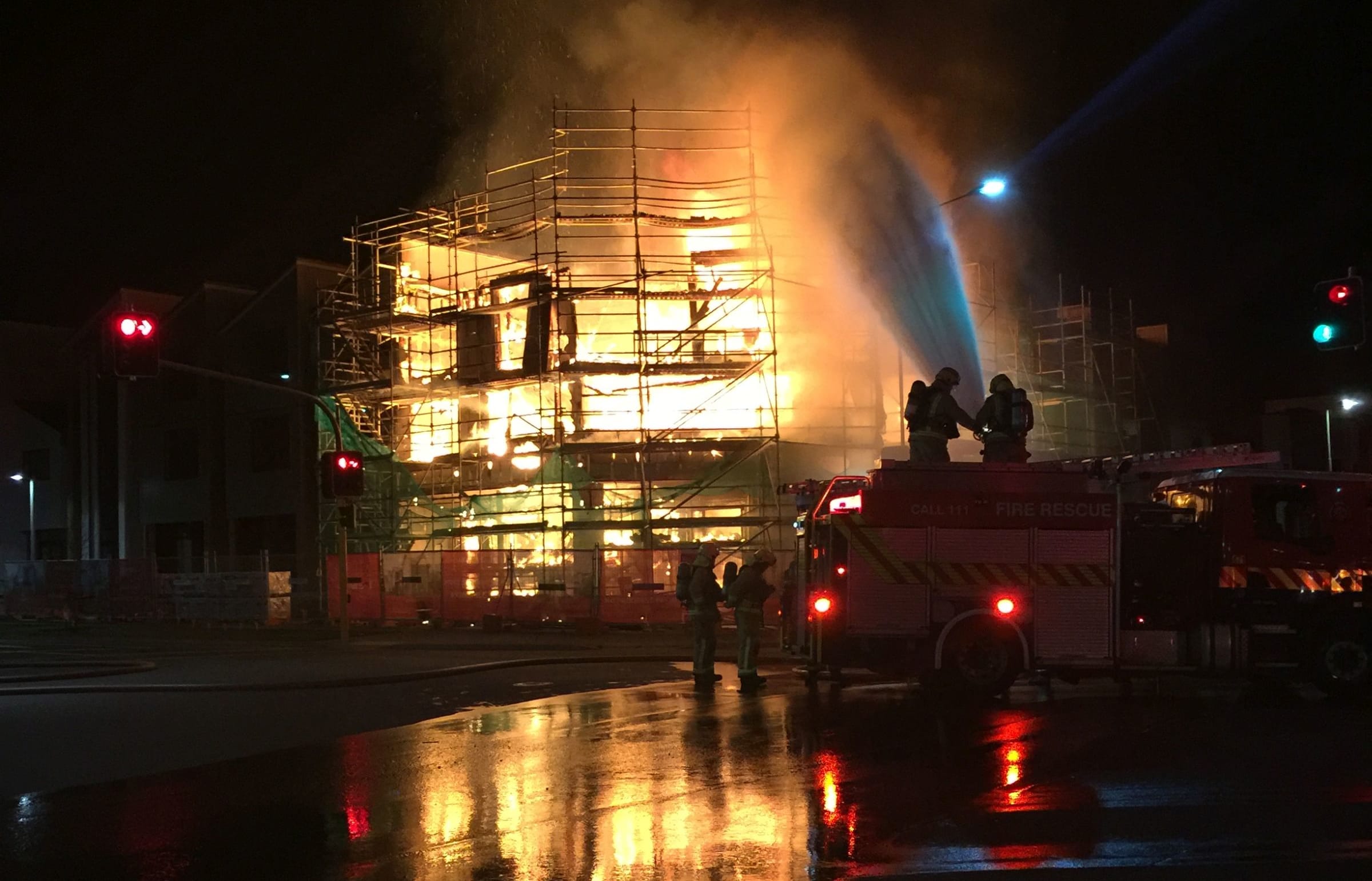 Flames engulfed a multi-storey building in the housing development.