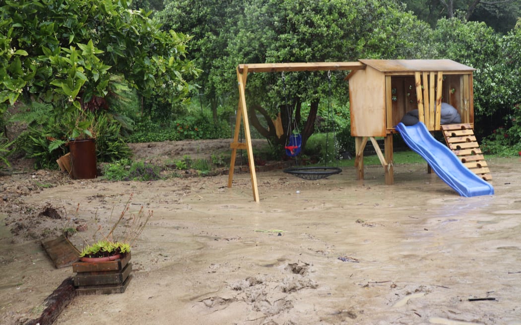 Katie Fitzpatrick’s backyard was covered with deep, thick silt after flooding in Gisborne.