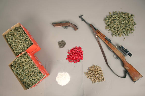 Drugs and firearms seized by police.