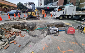 Work being done on a broken pipe in Wellington CBD which led to a water outage for at least 100 properties in the area.