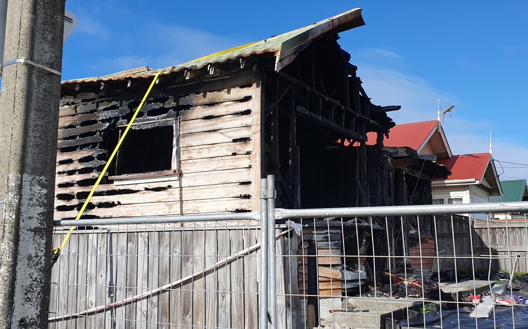 The burnt-out house in Kilbirnie where the aerial fire truck broke down in February.