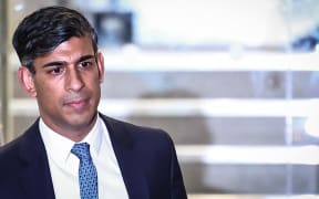 Britain's Prime Minister Rishi Sunak leaves the UK Covid-19 Inquiry, in west London, on December 11, 2023 after giving evidence. British Prime Minister Rishi Sunak defended his scheme to encourage people to eat out following the first coronavirus wave, saying it was not responsible for a second wave of infections. Sunak, who was finance minister during the crisis, told the public inquiry into the UK's handling of the pandemic that he was "deeply sorry" for those who lost family to the disease. (Photo by HENRY NICHOLLS / AFP)