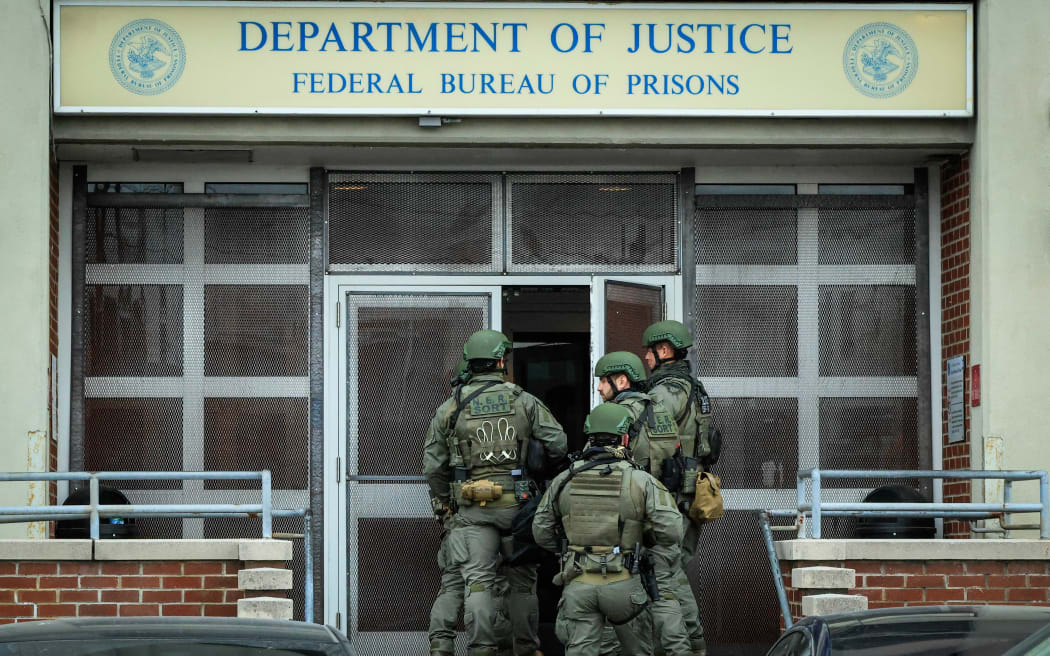 Agents with the Federal Bureau of Prisons arrive at the Metropolitan Detention Center in the Brooklyn borough of New York City, where ousted Venezuelan president Nicolas Maduro is being held on January 5, 2026. Deposed Venezuelan president Nicolas Maduro pleaded not guilty to charges of narco-terrorism in a New York court on Monday, two days after being snatched by US forces in a stunning raid on his home in Caracas. Maduro, 63, told a federal judge in Manhattan that he had been "kidnapped" from Venezuela and said "I'm innocent, I'm not guilty," US media reported. (Photo by Kena Betancur / AFP)