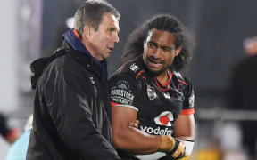 Bunty Afoa leaves the field injured with team doctor John Mayhew.