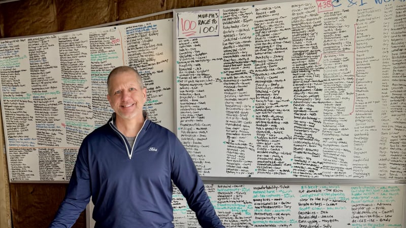 Mike O’Brien with his phrase board.