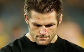 The All Blacks captain Richie McCaw  looks dejected after New Zealand's loss to the Wallabies.