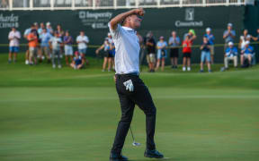 New Zealand golfer Steven Alker celebrates.