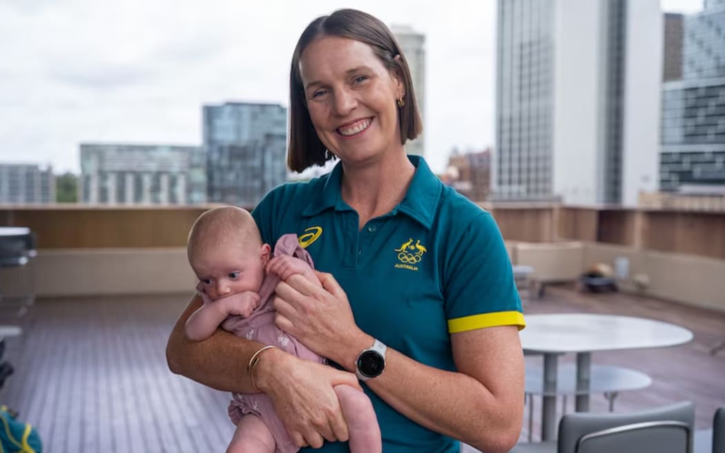 Three-time Olympian Alyce Wood with her youngest daughter Maeve, December 2025. (Photo by Fletcher Yeung of ABC Sport)