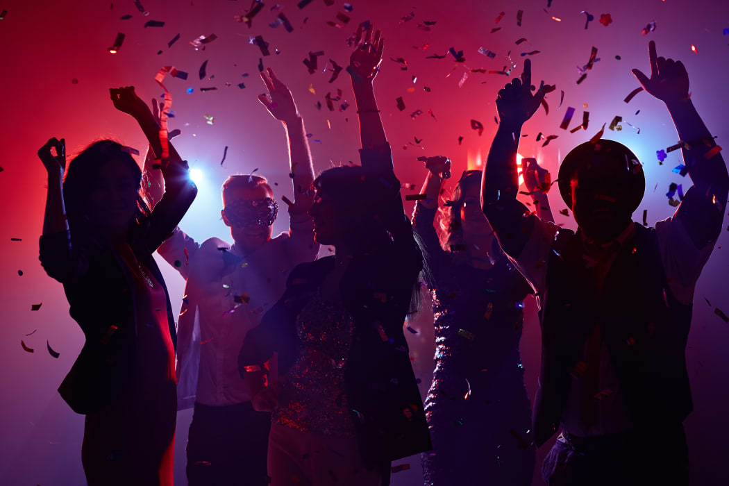 Party people having fun in nightclub