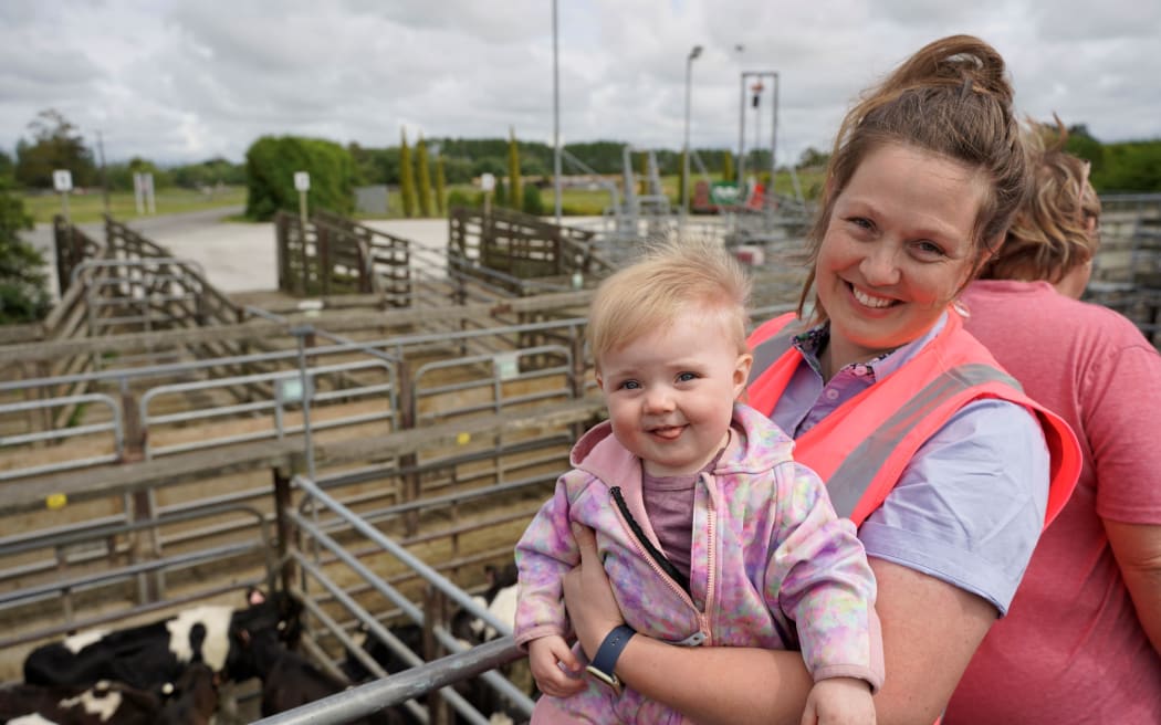 Kaye and her daughter check out the calves at the Temuka sale.