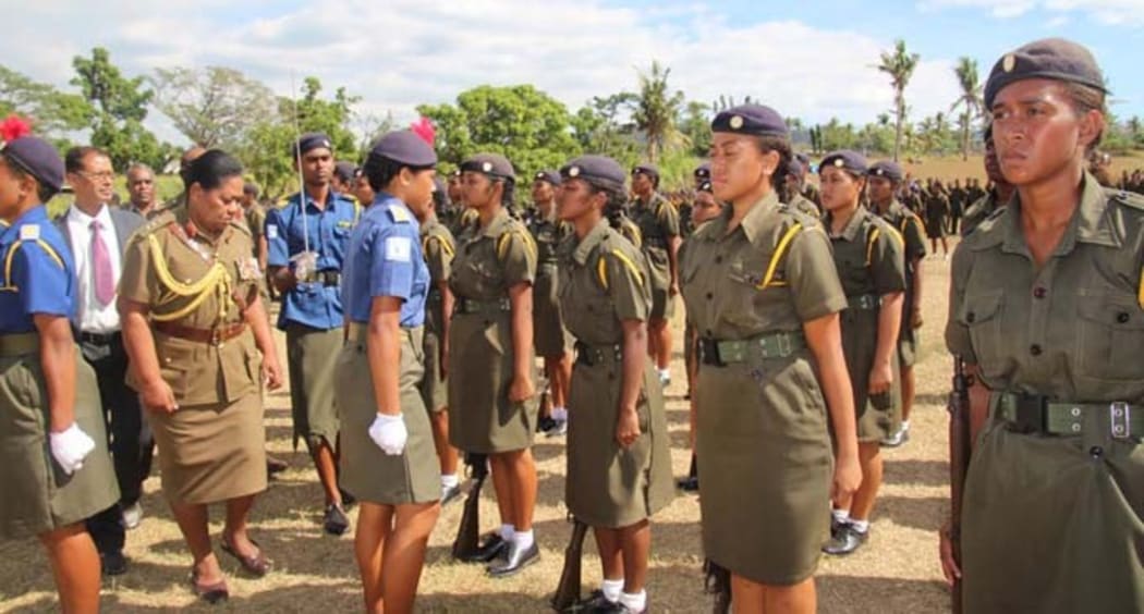 Colonel Litea Seruiratu (fourth from left) reviews detachment of female cadets at Xavier College in Ba.