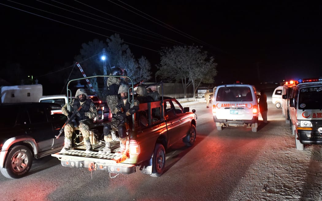 Pakistani troops arrive at the police training College in Quetta after the attack.