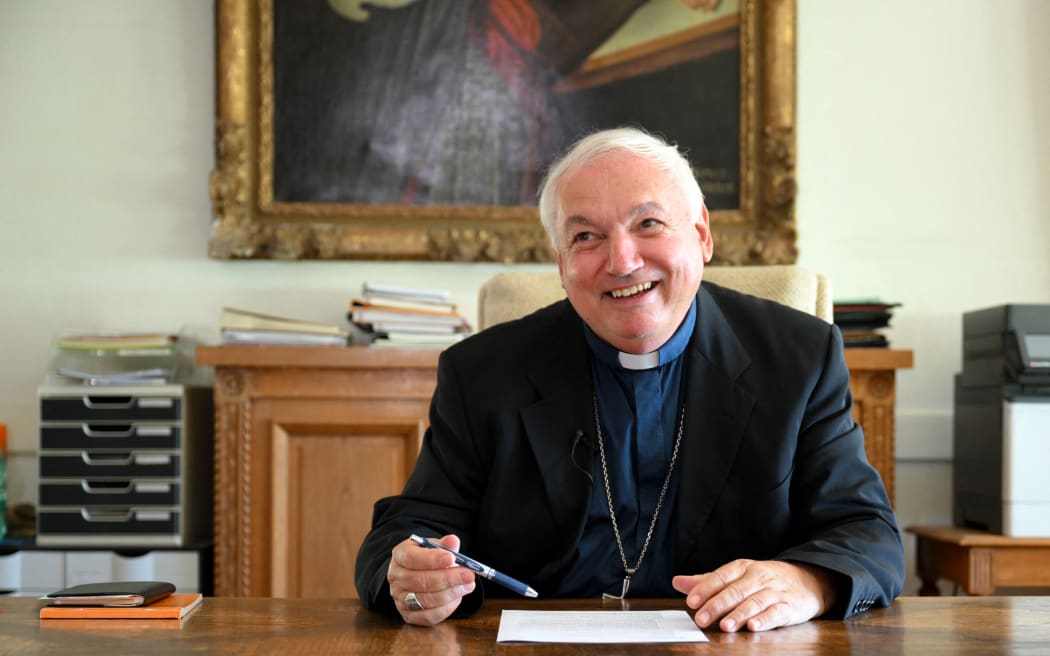 Archbishop of Marseille Jean-Marc Aveline poses for a picture in his office in Marseille, southern France, August 24, 2022. Nicolas. Pope Francis announces that he will create 20 new Cardinals at a Consistory next  August 27, 2022. (Photo by Nicolas TUCAT / AFP)