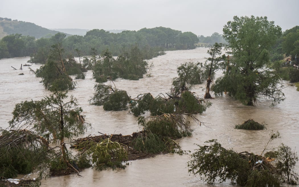 Texas flash flooding kills at least 13 people, leaves 20-plus young campers missing | RNZ News