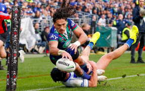 Dallin Watene-Zelezniak of the Warriors dives in to score. Canterbury Bulldogs v One NZ Warriors. NRL Rugby League, Accor Stadium., NSW, Australia, Saturday 6th July 2024 Copyright Photo: David Neilson / www.photosport.nz