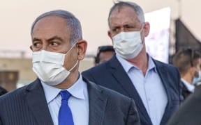 Israeli Prime Minister Benjamin Netanyahu (left) and his coalition partner Defence Minister Benny Gantz.