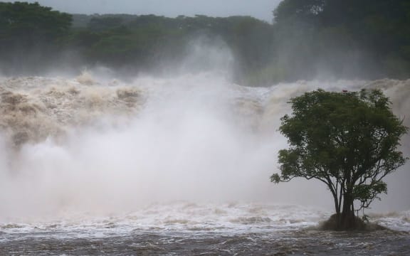 The Wailuku River flood waters run downstream on the Big Island. Mario Tama/Getty Images/AFP