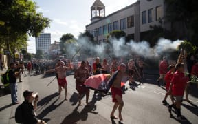 People gather in Redfern, Sydney, for the 10th Coloured Digger Anzac Day march.