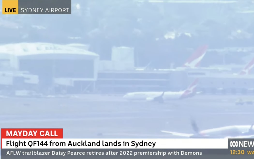 Fight QF144 from Auckland to Sydney has landed safely.