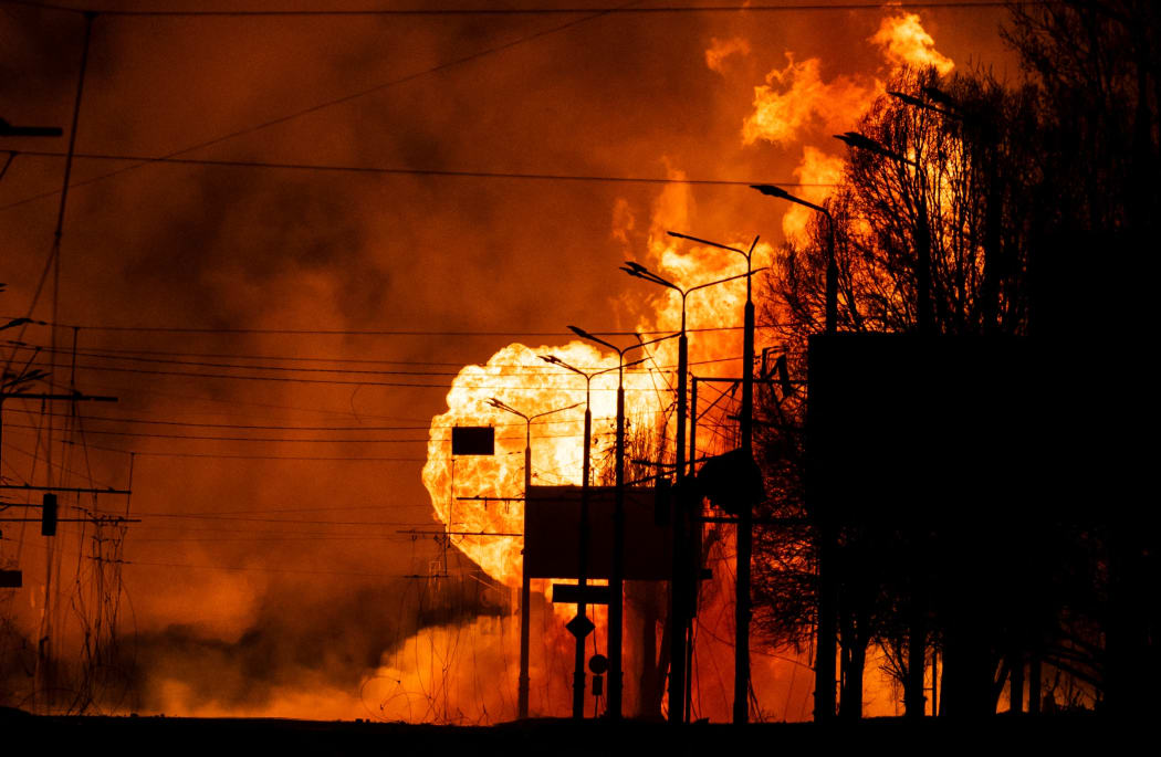 A gas station burns after Russian attacks in the city of Kharkiv, on March 30, 2022, amid Russian invasion of Ukraine.