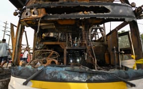 Burned out school bus in Bangkok, Thailand, 1 October 2024.