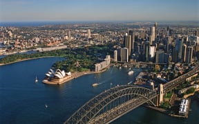 Australia, Sydney, Aerial view of city and bay (Photo by Paul Campbell / Image Source / Image Source via AFP)