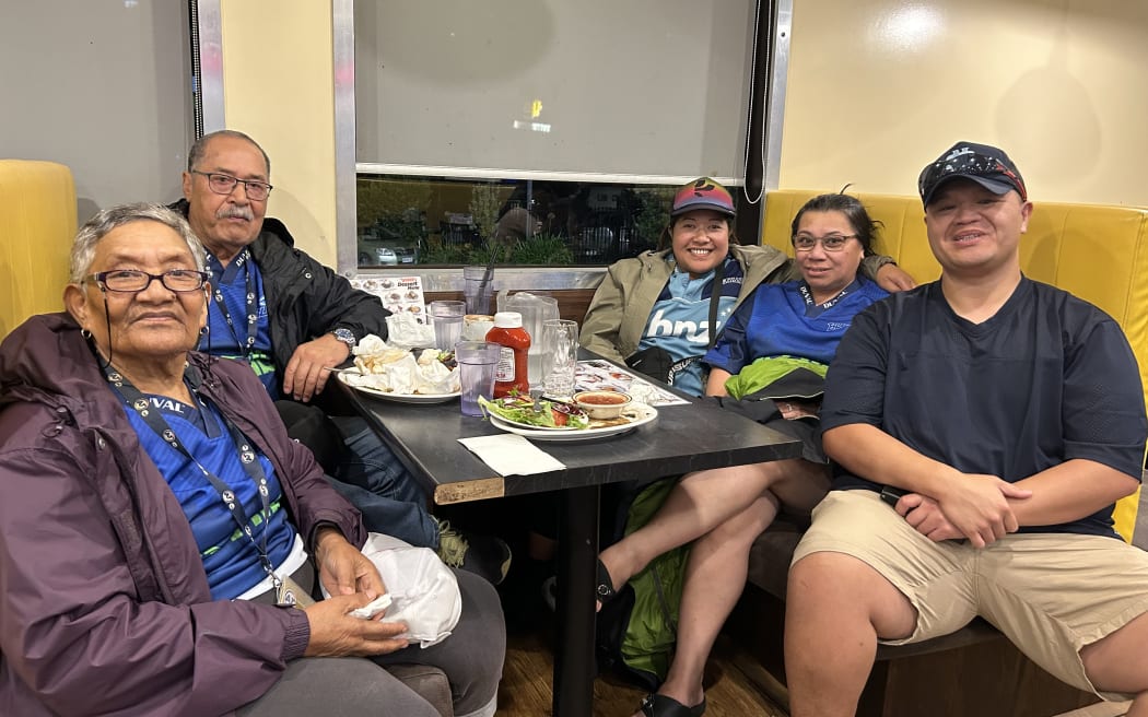Ina Silva and her family at Denny's after a Blues Game
