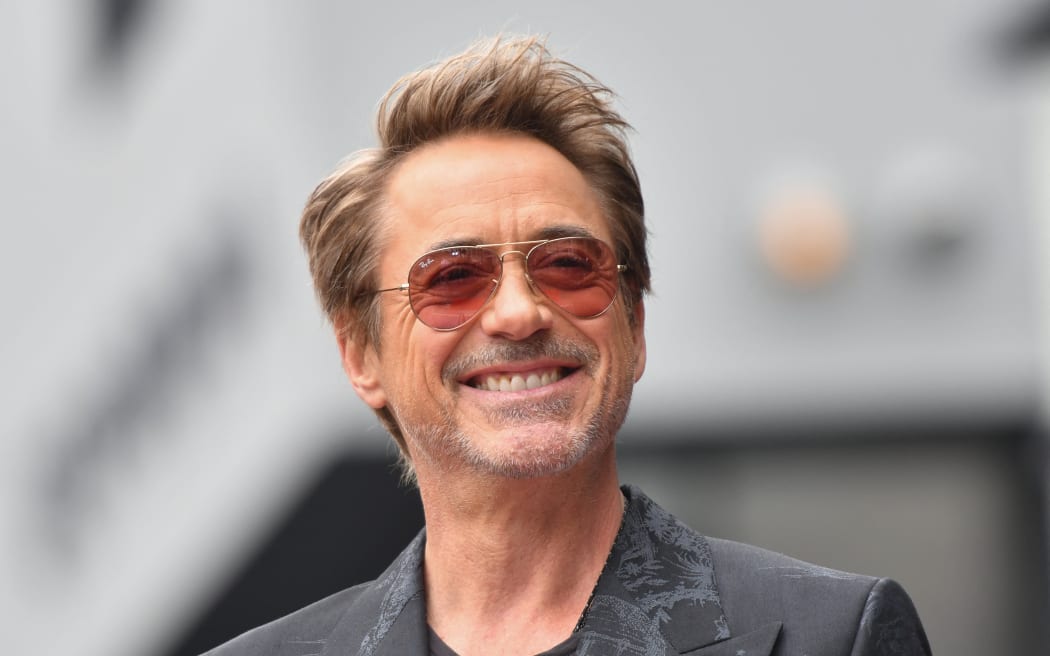 US actor Robert Downey Jr. speaks during Australian actor Chris Hemsworth’s Walk of Fame ceremony in Hollywood, California, May 23, 2024. (Photo by Chris DELMAS / AFP)