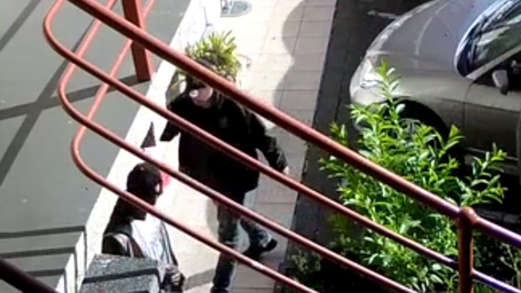 Two teenagers entering motel on Epsom Motel CCTV footage