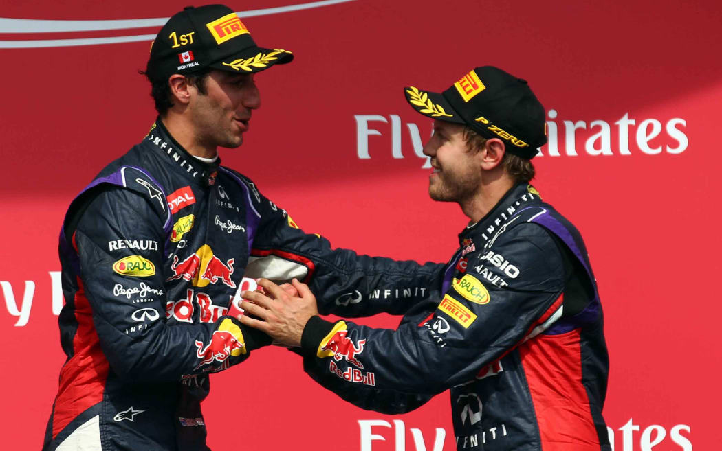 Daniel Ricciardo (AUS) Red Bull Racing,  Sebastian Vettel (GER). 2014.