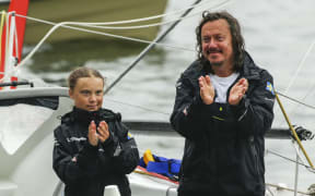 Swedish climate activist Greta Thunberg, 16, and father Svante Thunberg after a 15-day journey crossing the Atlantic in the Malizia II, a zero-carbon yacht, on August 28, 2019 in New York