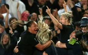 New Zealand's players celebrate after winning the Rugby World Cup.