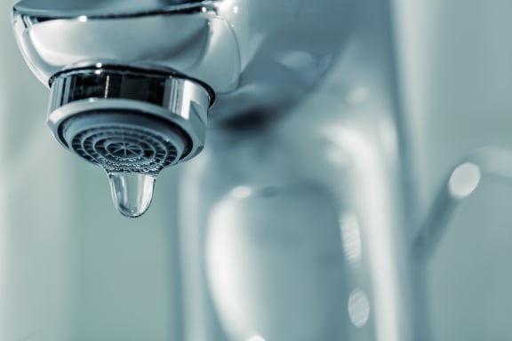Tap dripping water.