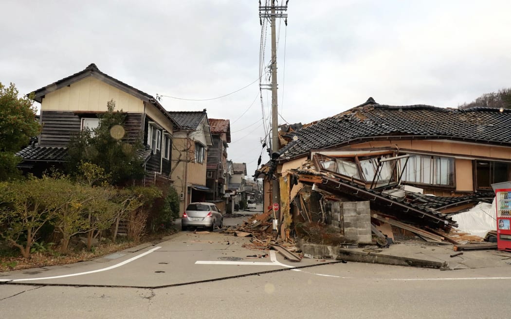 Buildings collapsed in Wajima City, after an earthquake on New Year's Day 2024.