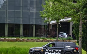 Police guard the entrance of the Natalie Medical Building at Saint Francis Hospital campus in Tulsa, Oklahoma, on 2 June 2022. - A gunman has killed five people at the hospital including himself in the latest in a string of mass shootings across the US in recent weeks.