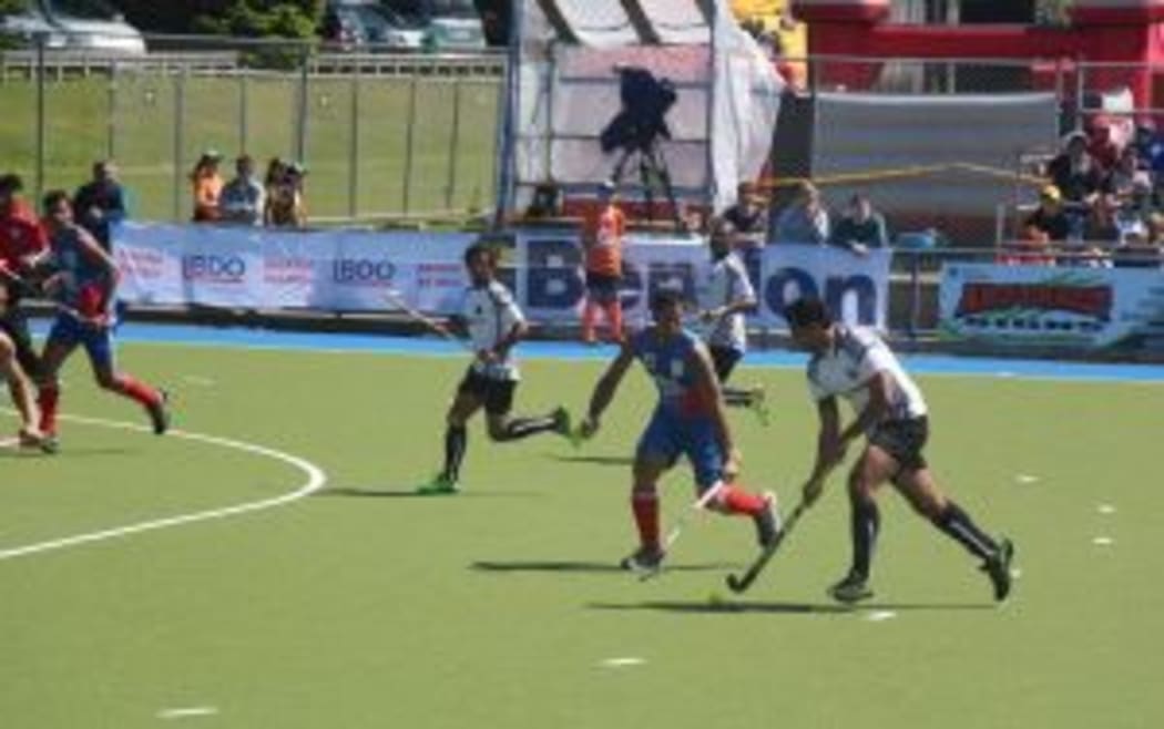 The Fiji and Samoa men's hockey teams during the 2015 Oceania Cup.