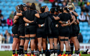 Black Ferns huddle in England 2021.