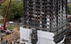 The burned-out-shell of Grenfell Tower in London.