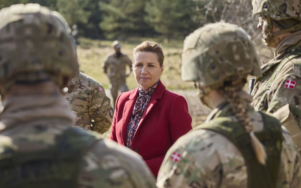 Danish Prime Minister Mette Frederiksen meets conscripts during a visit to Air Base Karup, the main air base of the Royal Danish Air Force, in Jutland, Denmark on March 7, 2024. (Photo by Mikkel Berg Pedersen / Ritzau Scanpix / AFP) / Denmark OUT