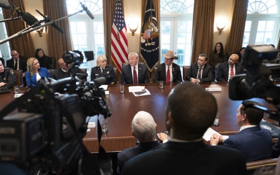 US President Donald Trump participates in a roundtable discussion on border security and safe communities at the White House on Friday.